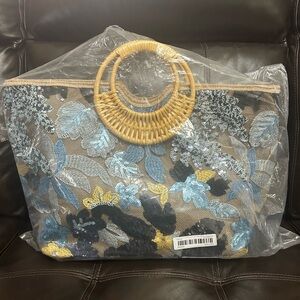 Sachet bag with classic sequence decor.Can be use as travel and tote bag.